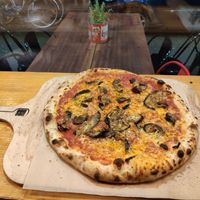 Marinara base with Wilmersburger vegan cheese, garlic and aubergine. at NeoNeo in Cologne