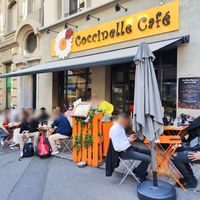 Outdoor seating at Coccinelle Café in Lausanne