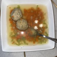 Matzo ball soup, sorry for the reflection of the overhead lights! at Sam & Gertie's in Chicago