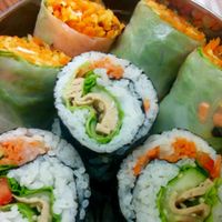 Arigato sushi: rice, non-gmo soy, carrots, sesame seed, seaweed, lettuce, cucumbers. Spring rolls: rice paper wraps, jicama, carrots, lettuce, non-gmo tofu, onion, roasted peanuts. at Loving Hut in Houston