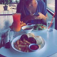 Wrap and Orange Joy drink  at Loving Hut in Houston