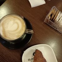 Cappuccino mit Hafermilch und Vollkorn-Marmeladen Croissant at Caffe Centrale in Fano
