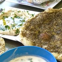 Clockwise from top left: Baba ghanouj, zaatar, cucumber (yogurt) salad at Al Tanour in Winnipeg
