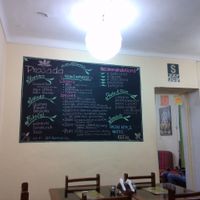 Menu on a blackboard inside Prasada at Prasada in Cusco