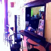 Old location, from 2010. The reverse view, looking 'into' the cooking area/window, and back towards to the street. at Prasada in Cusco