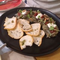 Berenjena asada con tomates secos y ricota vegetal at Doña Lola in Albacete