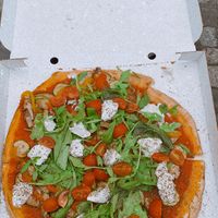 super good pizza with almond cheese  at Pizza Nation in Zurich