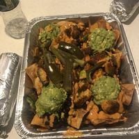 Full vegan nachos with fried avocados and guac  at Tacoria in Morristown