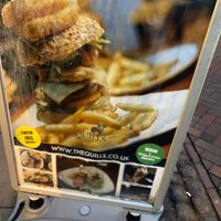 Vegan options clearly displayed on sandwich board at The Quills in Rochester