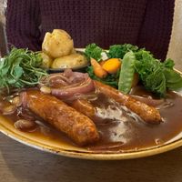 Vegan sausages, herby baby potatoes, red onion gravy & veg at Warkworth House Hotel in Warkworth