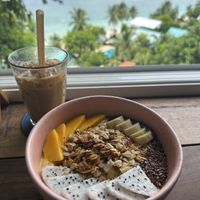 Iced oat milk coffee and mango bowl  at What's Cup! in Koh Phangan