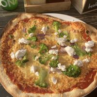 Vegan pizza with "feta cheese“  at Refugium in der Nordwand Kletterhalle in Hamburg