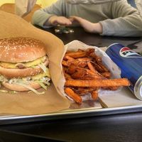 Double Furahaa burger, sweet potato fries and black soda (Pepsi)  at Furahaa - Vegan in Paris