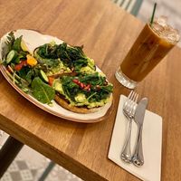 Avocado toast with sautéed spinach and pomegranate. Had amazing flavor   at Truth & Tonic in Las Vegas