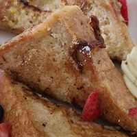 Vegan French Toast topped with strawberries and bananas at Truth & Tonic in Las Vegas