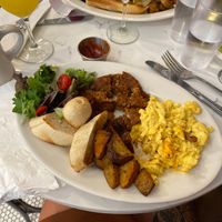 Vegan scrambled cheese eggs and vegan sausage  at Bonjour Cafe in Boston