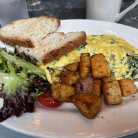 House omelet with just egg and plant based cheese at Bonjour Cafe in Boston