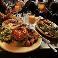 Vegan JUST egg sandwich with impossible sausage and avo on the right    at Bonjour Cafe in Boston