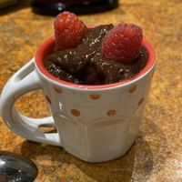 In-store made chocolate pudding in a tiny cup. Love it   at Loma House Vegetarian Express in Edmonton