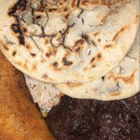 Plato Tipico (black bean pupusas, fried plantain, and rice)  at Rinconcito Salvadoreño in Port Chester