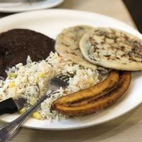 Pupusa platter with beans, rice, and plantano at Rinconcito Salvadoreño in Port Chester