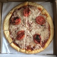 Vegan Margherita pizza. Dough was lacking. I felt that the texture was off. I wouldn’t order the pizza again.  at Gusto D'Oro Italian Cuisine in Yorba Linda