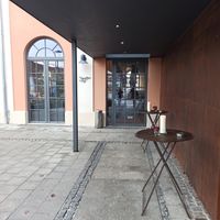 The entrance outside... at Giuseppe Café in Kolbermoor