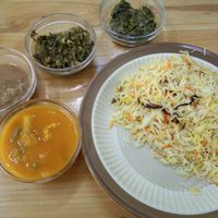 Mixed rice, lentils, and cooked veg, some curry at Clock Tower Cafe in Iringa