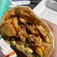 Sweet potato chili wrap (very tasty) at Feel Good Smoothie Bar and Cafe in Oneonta