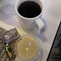 Coffee with side of oat milk.  They also have almond and soy.  at IAH -El Premio - Terminal E in Houston