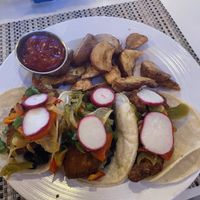 Fried avocado breakfast tacos.  Added fajitas and black beans to my order at no charge  at IAH -El Premio - Terminal E in Houston