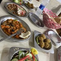 Green salad, aubergine, foul, falafel, breadd  at Mohamed Ahmed in Alexandria