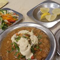 Alexandria foul, lentil soup and salad plate. Maybe a bit too much for one person, but soo delicious. And less than 100 egp! at Mohamed Ahmed in Alexandria