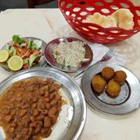 Fuul with tahini, baba ganoush, falafel, and green salad at Mohamed Ahmed in Alexandria