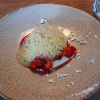 Dessert strawberriesalad with vanillacream and (libbsticka) on top. Marvellous! at Bellies in Stavanger
