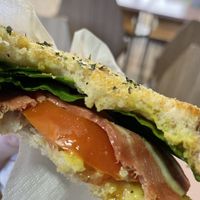 Bacon, tomato, spinach and mustard toast  at Moko Veggie Café - Alvalade in Lisbon