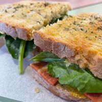  Bacon, tomato, spinach and mustard toast  at Moko Veggie Café - Alvalade in Lisbon