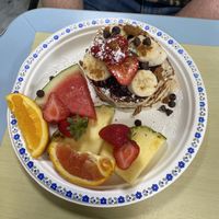 Pancakes with banana and berriess  at Karine's in Toronto