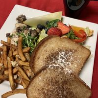 Vegan Supreme with mushroom surprise, French toast and garlic fries.  at Karine's in Toronto