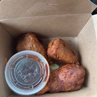 Drumsticks. Sauce came on the side for my to go order. These were surprisingly delicious. Even good the next day after being cold!  at Alice & Friends' Vegan Kitchen in Chicago