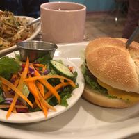  House made burger w/ yummy cheese and a salad w/ delicious cucumber dressing!  at Alice & Friends' Vegan Kitchen in Chicago
