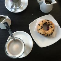 Vegan doughnut cake and soy latte at Naturalmente Vivo Pane in Vigonza