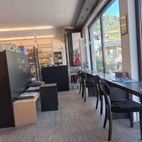Sitting area inside (you can choose to sit outside too) at Vier Jahreszeiten in Bad Honnef