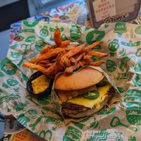 The vegan chilli cheese burger with sweet potato fries and vegan melted cheese dip at Bastard Burgers in Malmo