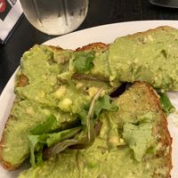 Avocado toast which was prettier before I ate half😄 at Mom's Kitchen & Bar in New York City
