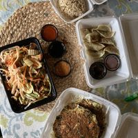 Clockwise from top: brown rice, mandoo dumplings, ocean seaweed tofu young, and energy nut 🌱   at Amitabul in Chicago