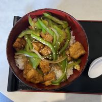 Sticky sweet sesame tofu donburi bowl  at Pompoko in Brighton