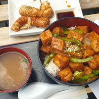 Sesame tofu don with Yubamaki tofu vegetable rolls and miso at Pompoko in Brighton