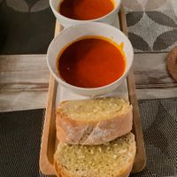 Tomato soup split 2 ways with garlic bread  at Downtown - Vegan Garden Restaurant in Chiang Mai