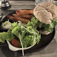 Mushroom burger with fries  at Downtown - Vegan Garden Restaurant in Chiang Mai